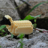 Sheep mini building blocks model, displayed in a natural setting